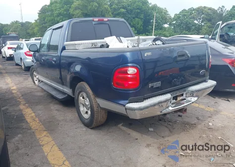 2002 Ford F-150 Lariat/Xlt z USA, uszkodzony, nr VIN 1FTRW07L92KC43061